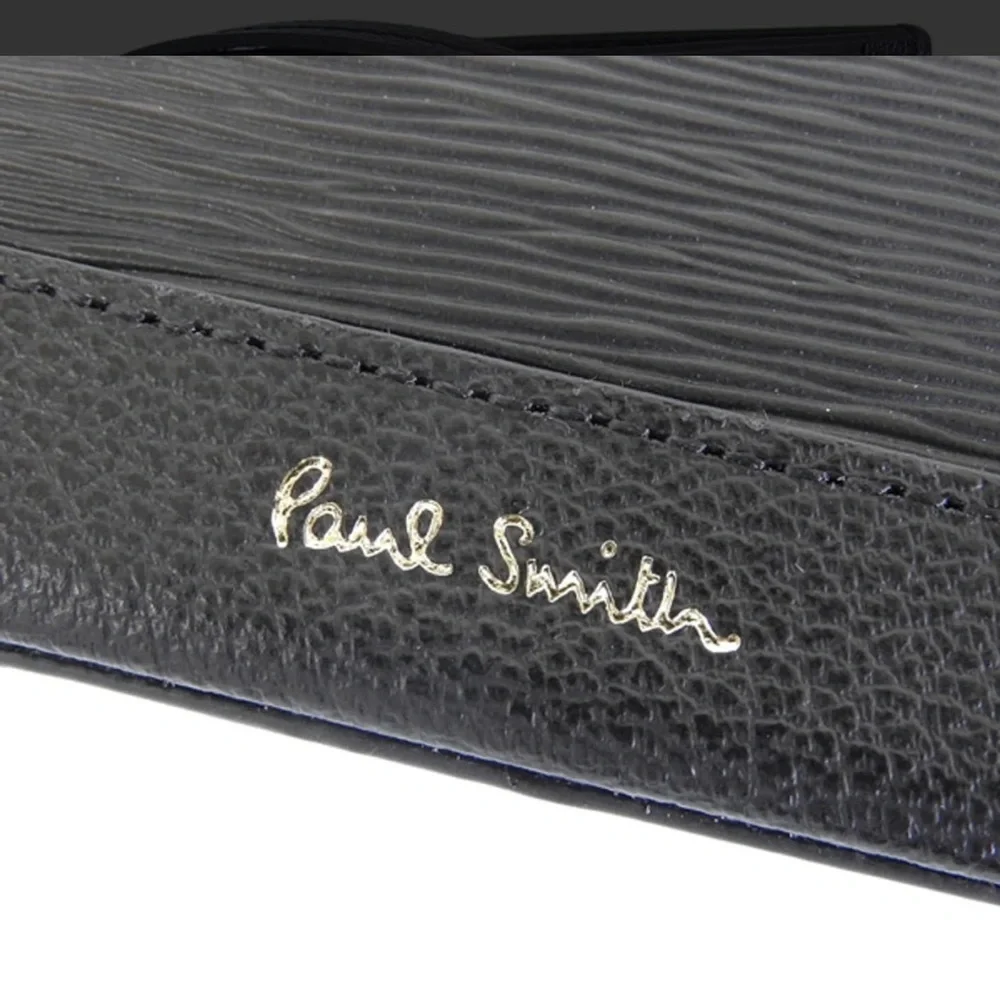 Check out Paul Smith!!Black Textured Leather card holder. NWOT.  Men or women’s